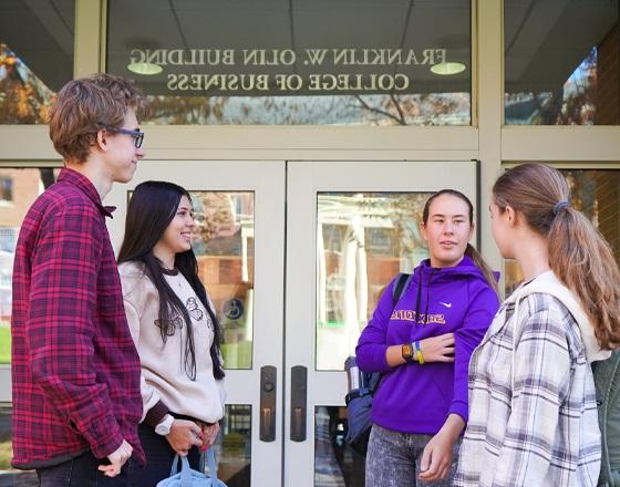 students outside of Olin building